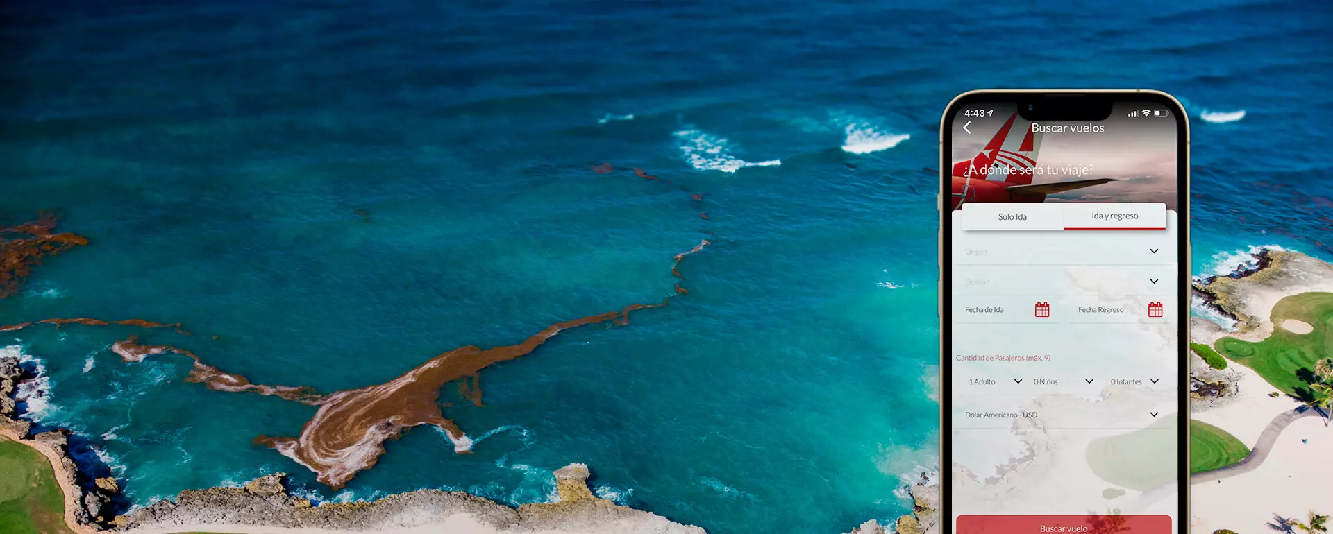 Teléfono con la app AviorAir sobre una costa caribeña